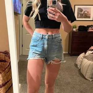 High waisted vintage, zip up, jean shorts.